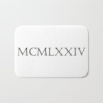 Roman Numerals 1974 Bath Mat By Birthday by frankenberg Society6